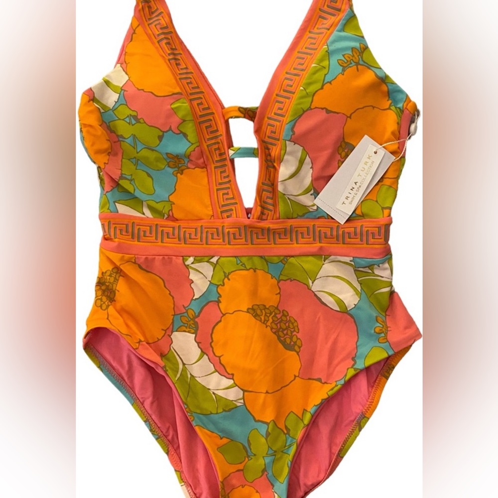 TRINA TURK PLAYA DE FLOOR PLUNGE MAILLOT,
PERFECT FOR SUMMER TRIPS - Picture 8 of 12